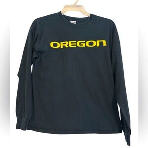 Oregon Ducks Navy Blue Long Sleeve T-Shirt with logo. In new condition, Size L